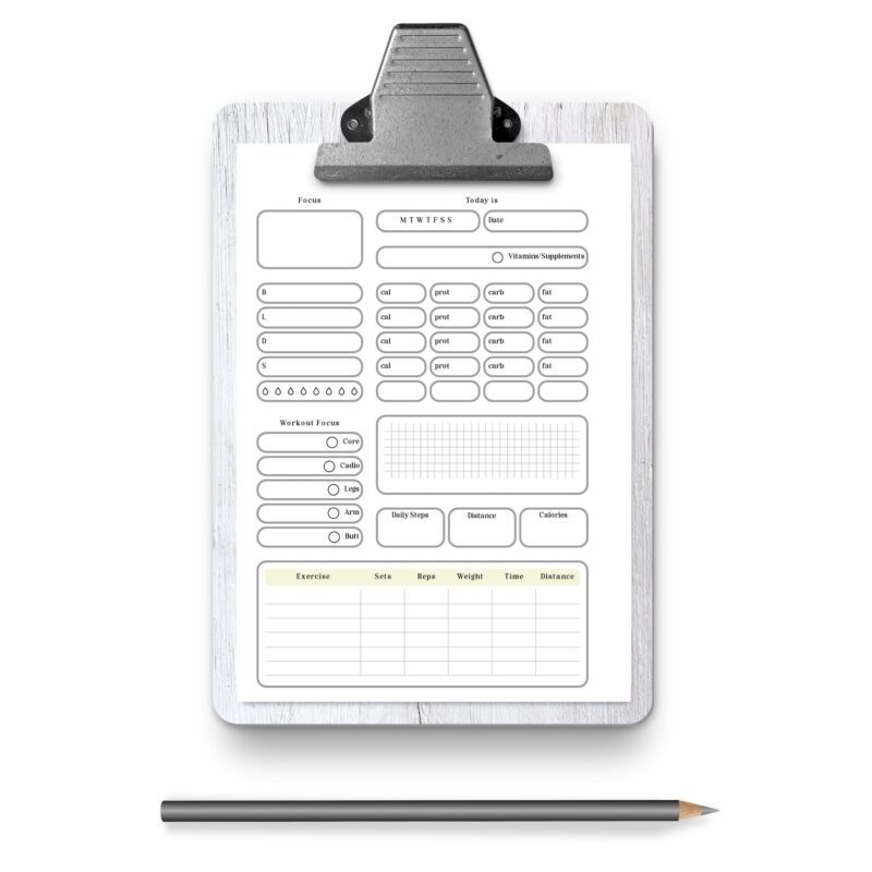 Minimalist A5 fitness planner on a workout mat