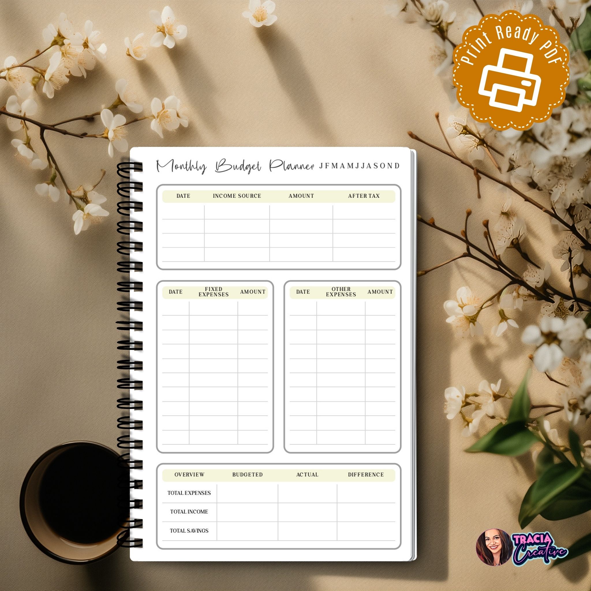 A5 Monthly Budget Planner laid flat with pen